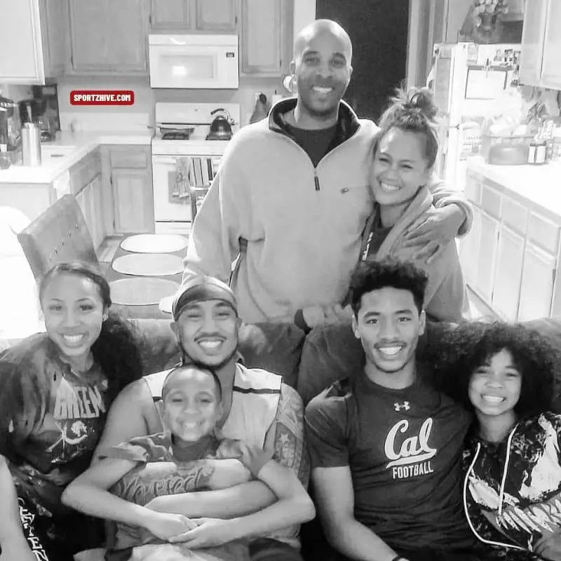 Camryn Bynum Family Photo; parents and his four siblings