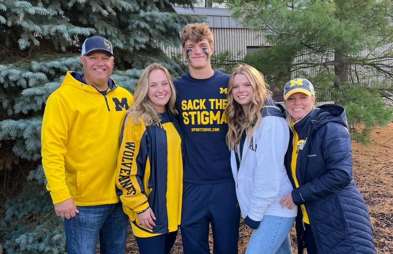 J.J. McCarthy with his Parents and Sisters